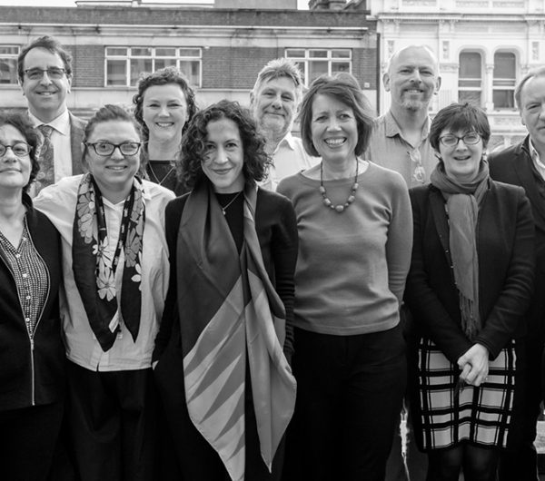 The Business of Fashion, Textiles and Technology team is shown in black and white image